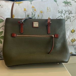 Pebble grain Lexington bag by Dooney & Bourke.